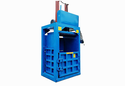 Vertical waste paper baler