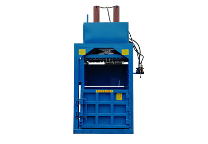 Vertical waste paper baler 